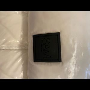 Sam. New York freedom puffy vest New with tags! Size small color:snow